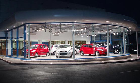 Unism reveals car showroom designed as a secret cavelike space