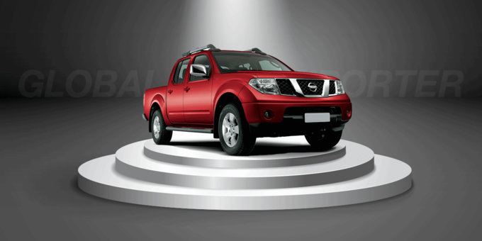 Red color Nissan Double Cabin on a rotatory stage